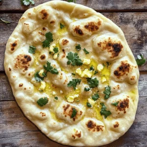 To make easy garlic naan bread, gather these simple ingredients: - 2 cups all-purpose flour - 1 teaspoon sugar - 1 teaspoon salt - 1 teaspoon baking powder - 1 tablespoon plain yogurt - 2 tablespoons milk - 3/4 cup warm water - 2 tablespoons minced garlic (about 4 cloves) - 2 tablespoons melted butter - Optional: Fresh cilantro for garnish Each ingredient plays a key role. Flour gives naan its structure, while the yogurt helps make it soft. The garlic adds flavor, making each bite special. Sugar and salt balance the taste, and baking powder helps it rise. Warm water activates the yeast, creating a light texture. If you want, fresh cilantro adds a pop of color and taste. This list is all you need to whip up delicious garlic naan. You can find the full recipe in the article. Enjoy cooking! - Mixing dry ingredients: Start by taking a large bowl. Add 2 cups of all-purpose flour, 1 teaspoon of sugar, 1 teaspoon of salt, and 1 teaspoon of baking powder. Whisk these together until they blend well. This will form the base for your naan. - Forming the dough: Make a well in the center of the dry mix. Pour in 1 tablespoon of plain yogurt and 3/4 cup of warm water. Stir with a spoon until the mixture forms a rough dough. - Kneading the dough: Transfer the dough to a clean, floured surface. Knead it for about 5 to 7 minutes. The goal is to make it soft and smooth. If it sticks, add a bit more flour. - Covering the dough: Place the kneaded dough in a greased bowl. Use a damp cloth or plastic wrap to cover it. This keeps the moisture in as it rises. - Timeframe for dough to double in size: Let the dough sit in a warm area for about 1 hour. You’ll know it’s ready when it has doubled in size. - Rolling out the dough: After rising, gently punch down the dough. Divide it into 6 equal pieces. Roll each piece into a ball. Take a ball and roll it out into an oval shape about 1/4 inch thick. - Cooking sequence on skillet: Preheat a skillet over medium-high heat. Brush the top of the rolled naan with melted butter. Sprinkle 2 tablespoons of minced garlic evenly on top. - Tips for achieving golden brown color: Place the naan in the hot skillet, garlic side up. Cook for 2-3 minutes until bubbles form. Flip it over and cook for another 1-2 minutes. Look for a golden brown color before taking it off the heat. Enjoy making this Easy Garlic Naan Bread! For the complete set of instructions, refer to the Full Recipe. To get the best naan, start with the right dough. The texture should be soft and smooth. If it feels sticky, add more flour slowly. Knead it well; this helps the dough rise. Timing is key when cooking. Don't rush it! Let the dough rise fully for the best texture. Cook each naan just until it bubbles, then flip to brown it. You can add fun flavors to your naan! Try mixing in spices like cumin or sesame seeds. They add a nice crunch and depth. If you want a twist, experiment with different garlic types. Roasted garlic gives a sweet taste, while fresh garlic is strong and zesty. Adding herbs like parsley or thyme can also change the flavor profile. For cooking, a skillet or tawa works best. A heavy-bottomed skillet holds heat well. If you don’t have a tawa, any flat pan will do. You can also use an oven. Preheat it high and bake the naan on a hot stone. Grilling is another option for a smoky taste. Just make sure to watch it closely! For the complete recipe, check out the Full Recipe section. {{image_4}} You can make naan even more fun with flavors. Here are some tasty ideas: - Cheesy garlic naan: Add shredded cheese on top of the garlic before cooking. Mozzarella or cheddar works well. The cheese melts and adds a creamy taste. - Herb-infused naan: Mix dried or fresh herbs like basil or oregano into the dough. This gives a fresh taste that pairs well with any meal. Do you need to change the recipe for diets? Here are some options: - Gluten-free naan: Use gluten-free flour blends instead of all-purpose flour. Make sure the blend has xanthan gum for the right texture. - Vegan modifications: Substitute yogurt with plant-based yogurt. You can replace butter with olive oil or coconut oil to keep it vegan-friendly. Feel free to try these variations to make the recipe your own. You can find the full recipe for garlic naan above. Enjoy experimenting! To keep your naan fresh, you need to store it right. First, let the naan cool completely after cooking. Then, you can wrap it in foil or plastic wrap. This keeps moisture in and prevents it from getting hard. Place the wrapped naan in the fridge if you plan to eat it soon. If you want to save naan for later, freezing is a great choice. Stack the naan with parchment paper between each piece. This prevents them from sticking together. Then, place the stack in a freezer bag. Squeeze out all the air before sealing. Naan can stay good in the freezer for up to three months. When you’re ready to eat your naan, there are a few ways to reheat it. The best method is to use a skillet. Heat the skillet over medium heat. Place the naan in the skillet for about 30 seconds on each side. This keeps the naan soft and warm. You can also use the oven. Preheat it to 350°F (175°C). Place the naan on a baking sheet and cover it with foil. Heat for about 10 minutes. This method also keeps the naan soft. Avoid the microwave if you can. It can make naan tough or dry. If you must use it, wrap the naan in a damp paper towel. Heat it for just 10-15 seconds. This helps retain some moisture, but it’s not as good as the other methods. For more tips and the full recipe, check out the Garlic Naan Delight section! Can I make garlic naan without yogurt? Yes, you can skip the yogurt. Substitute it with more water or milk. Yogurt adds flavor and helps the naan rise. Without it, the naan may be less soft. How can I make naan puff up more? To help naan puff up, ensure your dough is well-kneaded. A warm skillet also helps. When cooking, let the naan bubble before turning it over. What can I serve with garlic naan? Garlic naan pairs well with many dishes. Serve it with curries, stews, or dips. It also tastes great with yogurt or chutneys for added flavor. What to do if my dough doesn't rise? If your dough doesn't rise, check the yeast or baking powder. They may be old. Ensure your water is warm, not hot. A warm spot helps the dough rise better. Why is my naan sticking to the skillet? If naan sticks, your skillet may not be hot enough. Try using less dough on the skillet. A little oil can also help. Make sure to preheat your skillet well. Can I cook naan on a grill? Yes, you can cook naan on a grill. Preheat the grill and place the naan on it. Close the lid and cook until it puffs up and gets grill marks. How to adapt the recipe for an oven? To use an oven, preheat it to 500°F (260°C). Place the naan on a baking sheet lined with parchment paper. Bake for 4-5 minutes or until golden brown. The baking method is great for making more naan at once. To make garlic naan, you need simple ingredients and quick steps. Here’s what you will use: - 2 cups all-purpose flour - 1 teaspoon sugar - 1 teaspoon salt - 1 teaspoon baking powder - 1 tablespoon plain yogurt - 2 tablespoons milk - 3/4 cup warm water - 2 tablespoons garlic, minced (about 4 cloves) - 2 tablespoons butter, melted - Fresh cilantro, chopped (for garnish, optional) Start by mixing the dry ingredients in a bowl. Make a well and add yogurt and water. Stir until it forms a dough. Knead the dough for 5-7 minutes until it feels soft. Then, let it rise for one hour. Next, divide the dough into six balls. Roll each ball into a flat shape. Brush with butter and add minced garlic. Cook on a hot skillet for 2-3 minutes, flip, and cook for 1-2 more minutes. This recipe takes about 15 minutes to prep and 1 hour and 15 minutes in total. You can serve it warm with your favorite curry. Enjoy this garlic naan delight! You learned how to make delicious garlic naan from scratch. We covered the ingredients, step-by-step instructions, and tips for perfecting the naan. You can explore different flavors and dietary options too. Store your naan properly and reheat it to keep it soft. Making garlic naan is fun and rewarding. It brings joy to your meals. Enjoy trying this recipe and sharing your creations with family and friends. Happy cooking!