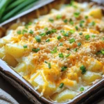 To make Pickle Ranch Potato Casserole, you need some key ingredients. Here’s what you’ll need: - 4 large russet potatoes, peeled and diced into 1-inch cubes - 1 cup dill pickles, finely chopped - 1 cup sour cream, preferably full-fat for creaminess - 1 cup ranch dressing, your preferred brand - 1 cup shredded sharp cheddar cheese, divided - 1/2 cup green onions, thinly sliced (reserve some for garnish) - 1/2 teaspoon garlic powder - 1/2 teaspoon salt - 1/4 teaspoon freshly ground black pepper - 1/2 cup breadcrumbs (panko or regular, for extra crunch) - 2 tablespoons olive oil, for topping These ingredients blend together to create a rich and creamy dish. The potatoes serve as a hearty base, while the pickles add a nice zing. You can make this casserole your own by adding fun ingredients. Here are some ideas: - Cooked bacon bits for a smoky flavor - Chopped bell peppers for color and crunch - A sprinkle of paprika for a slight kick - Different types of cheese, like mozzarella or gouda Feel free to tweak the recipe to fit your taste. Each addition can change the flavor and texture. Choosing the right brands can make a huge difference. Here are my top picks: - For ranch dressing, try Hidden Valley or Ken's Steakhouse. - Use Daisy sour cream for its smooth texture and taste. - Kraft sharp cheddar cheese adds great flavor. - Choose fresh dill pickles from Claussen for that tangy crunch. These brands can help ensure your casserole stands out. Remember, quality ingredients lead to the best flavors! If you want to see the full recipe, just check the link. Start by peeling the russet potatoes. Dice them into 1-inch cubes. Place them in a large pot. Fill the pot with water and bring it to a boil. Carefully add the potatoes and cook for about 15 minutes. You want them tender but firm. Drain the potatoes and let them cool slightly. In a large bowl, mix the sour cream and ranch dressing. Add garlic powder, salt, and black pepper. Use a whisk or spatula to blend until smooth. This mixture gives the casserole its creamy flavor. Gently fold the cooled potatoes into the sour cream mixture. Add the chopped dill pickles, 1/2 cup of cheddar cheese, and half of the green onions. Mix carefully to keep the potato cubes intact. Transfer the mixture to a greased 9x13 inch baking dish. Spread it evenly for even cooking. Preheat your oven to 375°F (190°C). Mix breadcrumbs with olive oil in a small bowl. Coat the breadcrumbs well and sprinkle them over the casserole. Then, add the remaining cheddar cheese on top. Bake for 25-30 minutes until the top is golden brown and bubbly. Let it cool for 5-10 minutes before serving. Enjoy this delightful dish! For the Full Recipe, check the earlier section! To cook your potatoes just right, start with firm, fresh russets. Peel and dice them into 1-inch cubes. This size helps them cook evenly. Bring water to a boil, then add the potatoes. Boil them for about 15 minutes. Check for tenderness with a fork. They should be soft but not mushy. Drain them well to avoid a watery casserole. Let them cool slightly before mixing. If you have leftovers, store them in an airtight container. Let the casserole cool to room temperature before sealing it. This prevents moisture buildup. Store it in the fridge for up to four days. If you want to keep it longer, consider freezing it. Make sure to wrap it tightly in plastic wrap and then foil. This keeps the flavors fresh. Pickle Ranch Potato Casserole pairs well with many sides. I love serving it with a crisp green salad. You can also add roasted vegetables for a colorful plate. For protein, grilled chicken or baked fish make great choices. If you want more flavor, consider adding a dollop of extra ranch dressing on top. For the best experience, serve it warm with a sprinkle of fresh green onions. {{image_4}} You can easily make this dish vegan or dairy-free. Swap the sour cream for a plant-based alternative, like cashew cream or coconut yogurt. Use a dairy-free ranch dressing as well. Instead of cheese, try using nutritional yeast. This gives a cheesy flavor without dairy. You can also use vegan cheese shreds, which melt nicely. If you're not a fan of sharp cheddar, you can choose other cheeses. Creamy mozzarella can add a mild taste. Pepper jack cheese will bring some spice. You can even try feta for a tangy kick. Mixing different cheeses can create a unique flavor. Don't be afraid to experiment! There are many ways to jazz up this casserole. Consider adding cooked bacon for a savory crunch. You can mix in some roasted garlic for a rich taste. Chopped bell peppers or mushrooms add color and texture. Fresh herbs, like dill or parsley, can brighten the dish. Feel free to get creative and add your favorites! To keep your Pickle Ranch Potato Casserole fresh, store leftovers in an airtight container. Place it in the fridge for up to four days. Make sure it cools completely before sealing to avoid moisture buildup. This helps to keep it safe and tasty for later meals. If you want to save some for a later date, freezing is a great option. First, let the casserole cool down. Next, cut it into portions for easy thawing. Wrap each portion tightly in plastic wrap, then place them in a freezer-safe bag. It can last in the freezer for up to three months. When you’re ready to enjoy it, just thaw it in the fridge overnight. When it's time to reheat, the best method is in the oven. Preheat your oven to 350°F (175°C). Place the casserole in an oven-safe dish and cover it with foil. Bake for about 20-25 minutes, or until heated through. This keeps the texture nice and helps the cheese melt evenly. For a crispy top, remove the foil during the last few minutes. Enjoy your delicious meal as if it was freshly made! Yes, you can make this casserole ahead of time. Prepare the dish up to the baking step. Cover it tightly and place it in the fridge. This way, you save time on busy days. Just remember to bake it when you are ready. If it’s cold from the fridge, add a few extra minutes to the bake time. You can pair this casserole with many sides. A fresh green salad works well. You might also enjoy it with grilled chicken or pork. For a fun twist, serve it with baked beans. The flavors mix nicely, and everyone will love it! Yes, you can easily make this casserole gluten-free. Simply use gluten-free breadcrumbs instead of regular ones. Most ranch dressings are gluten-free, but check the label to be sure. This way, you can enjoy the dish without worry. For more details on making this dish, check the Full Recipe. It has all the steps and tips you need to create this tasty casserole. Enjoy the process and have fun cooking! Pickle Ranch Potato Casserole is easy to make. We covered key ingredients and tips to boost flavor. You can customize it while ensuring great taste with recommended brands. Storing leftovers is simple, and reheating keeps it fresh. In short, this dish fits any meal. Feel free to try variations, like dairy-free options. Enjoy this delicious casserole as a fun and tasty treat!