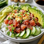 - 1 cup sushi rice - 8 oz sushi-grade tuna - 2 tablespoons mayonnaise - 1 tablespoon sriracha sauce - 1 ripe avocado - 1 small cucumber - 1 sheet of nori - Sesame seeds - Soy sauce - 1 tablespoon rice vinegar - 1 teaspoon granulated sugar - 1/2 teaspoon sea salt - Green onions for garnish - Optional: pickled ginger Gather these fresh ingredients to make delicious spicy tuna sushi bowls. Sushi rice forms the base. It has a sticky texture that holds everything together. Sushi-grade tuna adds a burst of flavor. Be sure to use fresh fish for the best taste. Mayonnaise gives the tuna a creamy texture. Sriracha sauce brings heat and depth. Adjust this to match your spice level. For crunch, add ripe avocado and cucumber. They add freshness and balance the heat. The sheet of nori adds a nice touch. It’s a classic sushi flavor. Sesame seeds finish the dish with a nutty flavor. You can enhance your bowl with seasoning. Rice vinegar adds a bit of tang. Granulated sugar helps balance the vinegar's acidity. Sea salt brings out all the flavors. Green onions give a pop of color and taste. If you like, add pickled ginger for extra zing. This recipe is not just tasty; it's also fun to make. Get ready to enjoy a flavor-packed delight. For the full recipe, check the instructions and create your masterpiece! - Rinse sushi rice: First, you need to rinse the sushi rice. Use cold water and rinse until the water runs clear. This step helps remove extra starch. - Combine rice with water: Next, add the rinsed rice to a medium saucepan. Pour in 1 1/4 cups of water. - Cooking process and resting time: Bring the pot to a boil over medium heat. Once it boils, cover the pot and lower the heat to a simmer. Cook for 18-20 minutes until the water is gone. After cooking, let it sit covered for 10 minutes. This steaming time makes the rice fluffy. - Combine tuna, mayo, and sriracha: In a medium bowl, mix 8 oz of sushi-grade tuna, 2 tablespoons of mayonnaise, and 1 tablespoon of sriracha. Stir until everything is well blended. - Adjusting spice levels: Taste the mixture. If you want it spicier, add more sriracha. It’s all about your taste! - Importance of freshness: Always use fresh sushi-grade tuna. Freshness makes the dish taste better and safer to eat. - Layering sushi rice and toppings: Start with a layer of the seasoned sushi rice in each bowl. Spoon the spicy tuna mixture on top. - Incorporating garnishes: Add slices of avocado and julienned cucumber for a nice crunch. These toppings add freshness and flavor. - Serving suggestions: Garnish with sesame seeds and nori strips. Serve with soy sauce and pickled ginger on the side for a zing. Enjoy your flavorful creation! Rinsing the sushi rice is key. It removes excess starch. This helps the rice become sticky and perfect for sushi. Rinse it under cold water until the water runs clear. Doing this will improve the texture. The cooking time is important too. Combine the rinsed rice with 1 1/4 cups of water. Bring it to a boil, then reduce the heat to a simmer. Cover the pot and cook for 18-20 minutes. After cooking, let it steam for 10 more minutes. This will give you fluffy rice. You can adjust the spice level to fit your taste. Start with 1 tablespoon of sriracha. Mix it well with the tuna, mayo, and green onion. Taste it and add more sriracha if you want it spicier. Feel free to use different toppings. You could add mango for a sweet twist or radishes for crunch. Also, try using different types of fish, like salmon. It gives a unique flavor and keeps things fresh. Serving your sushi bowls attractively makes a big difference. Use colorful plates or a wooden board. This adds a nice touch to your meal. Arrange the ingredients neatly for a clean look. Consider using bowls with depth to show off the layers. Small dishes for soy sauce and pickled ginger add a nice touch. Garnish with sesame seeds and fresh herbs to make it pop. For the best effect, use a bright, contrasting dishware. {{image_4}} You can switch up the proteins in your spicy tuna sushi bowls. Salmon is a great choice. It has a rich flavor and pairs well with spicy sauces. You can use sushi-grade salmon in the same way as tuna. Tofu is another fantastic option. It offers a vegetarian twist. Use firm tofu for a nice texture. Dice the tofu and marinate it with soy sauce and a bit of sriracha. This gives it a tasty kick. You can easily change the flavor of your bowls. Adding citrus can brighten up the dish. A squeeze of lime or lemon juice brings a fresh taste. You can also try using herbs like cilantro or mint for an extra layer of flavor. Adjusting sauces can create unique tastes. Instead of sriracha, you could use a spicy garlic sauce. Mixing in a bit of sesame oil can add depth and richness to your bowls. Think about different toppings to inspire your bowls. Japanese-inspired toppings like daikon radish or pickled vegetables add crunch and color. You can also explore fusion ideas. Try adding tropical fruits like mango or pineapple. These fruits give a sweet contrast to the spicy tuna. You can mix and match to find your perfect bowl. For the full recipe, check out the main section above. To keep sushi rice fresh, place it in an airtight container. You want to avoid exposure to air. This helps keep the rice from drying out. Sushi rice can last up to three days in the fridge. For the leftover tuna mixture, transfer it to a separate container. Ensure it is sealed tightly. The tuna will stay good for about two days. Always check for freshness before using it again. When reheating sushi rice, add a splash of water. This helps restore moisture. Microwave it in short bursts, stirring in between. Avoid overheating, as it can ruin the texture. You can use sushi leftovers in different dishes. Try adding the spicy tuna to a salad or on a cracker. It also works well in a sushi burrito or a rice bowl. Sushi-grade tuna is best used within two days of purchase. Always check for bright color and a fresh smell. If it has a sour scent, do not eat it. Mayonnaise can last about two months after opening if stored in the fridge. Be sure to check the expiration date. Sauces like sriracha also have long shelf lives but check for any changes in smell or color. For a detailed guide on making these bowls, refer to the Full Recipe. You need sushi-grade tuna for the best flavor and safety. Sushi-grade means the fish is fresh and safe to eat raw. Look for fish labeled as sushi-grade at your local market or fishmonger. The flesh should be bright, shiny, and firm. Avoid dull or discolored fish. Choosing quality tuna makes a huge difference in taste. Yes, you can prep parts of this dish in advance. Cook the sushi rice and let it cool before storing it in the fridge. Prepare the spicy tuna mixture and keep it chilled until serving. Just remember to assemble the bowls right before you eat. This keeps the rice fresh and the toppings crunchy. This method works great for meal prep or quick weeknight dinners. If you can't find sushi rice, you have options. You can use short-grain rice, jasmine rice, or even brown rice. These types offer different textures and flavors. Just cook them according to the package instructions. For a twist, try quinoa or cauliflower rice for a low-carb option. Adjust water amounts and cooking times based on the rice type you choose. Enjoy experimenting with these alternatives! In this article, we explored how to create delicious Spicy Tuna Sushi Bowls. We covered key ingredients like sushi rice, fresh tuna, and avocado. I shared step-by-step instructions for making the rice and the spicy tuna mixture. You learned tips for personalizing your bowl and making it look great. Lastly, we discussed storing leftovers and answered common questions. Now you can enjoy this dish at home with simple steps. Dive in and have fun making it your own!